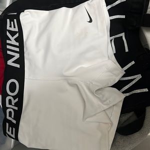 WHITE NIKE PROS SIZE SMALL